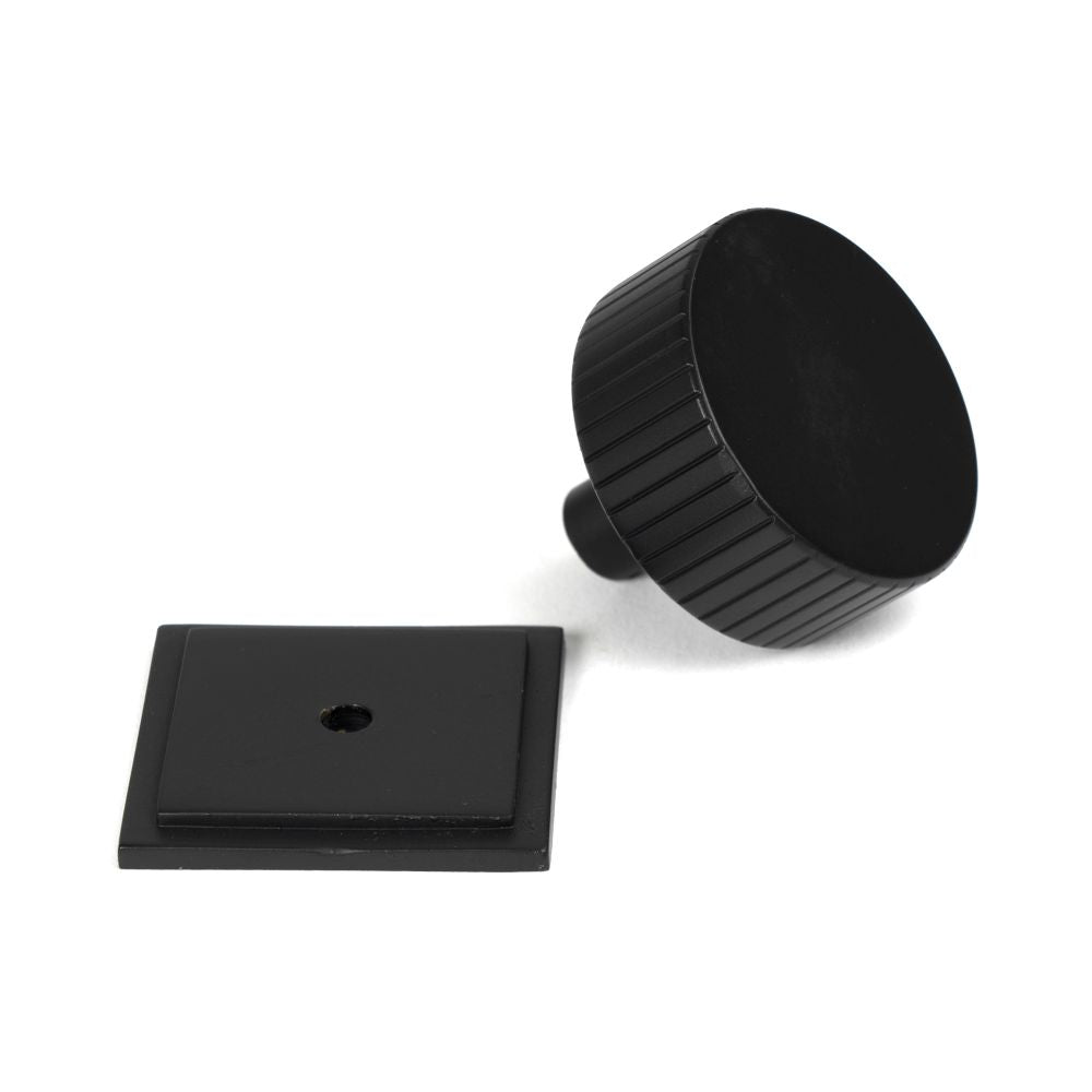 This is an image showing From The Anvil - Matt Black Judd Cabinet Knob - 38mm (Square) available from trade door handles, quick delivery and discounted prices