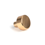 This is an image showing From The Anvil - Polished Bronze Kelso Cabinet Knob - 25mm (No rose) available from trade door handles, quick delivery and discounted prices