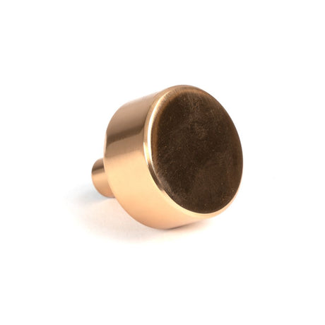 This is an image showing From The Anvil - Polished Bronze Kelso Cabinet Knob - 32mm (No rose) available from trade door handles, quick delivery and discounted prices