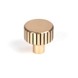 This is an image showing From The Anvil - Polished Bronze Judd Cabinet Knob - 25mm (No rose) available from trade door handles, quick delivery and discounted prices