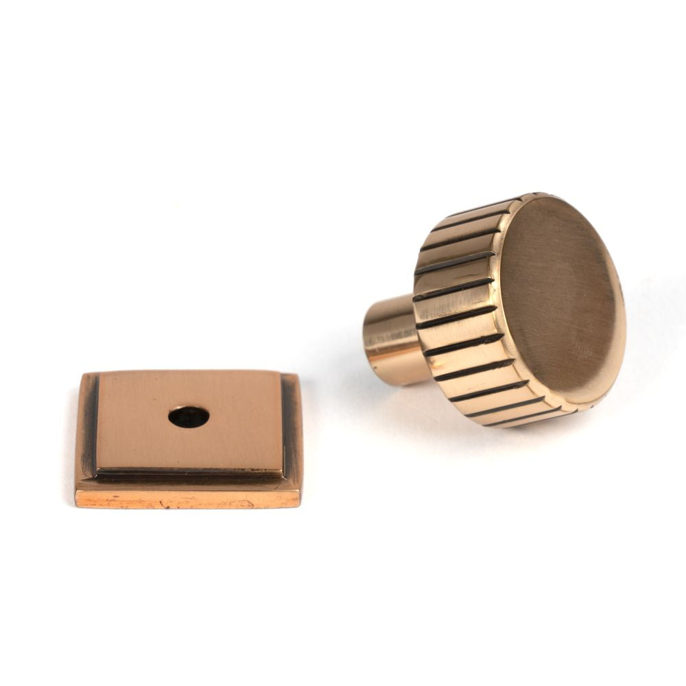 This is an image showing From The Anvil - Polished Bronze Judd Cabinet Knob - 25mm (Square) available from trade door handles, quick delivery and discounted prices