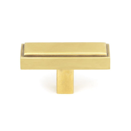 This is an image showing From The Anvil - Aged Brass Scully T-Bar available from trade door handles, quick delivery and discounted prices