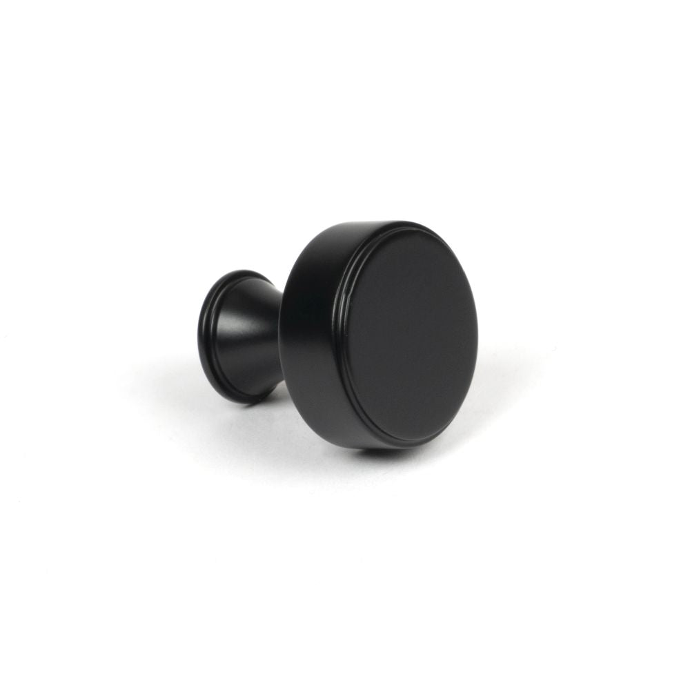 This is an image showing From The Anvil - Matt Black Scully Cabinet Knob - 25mm available from trade door handles, quick delivery and discounted prices