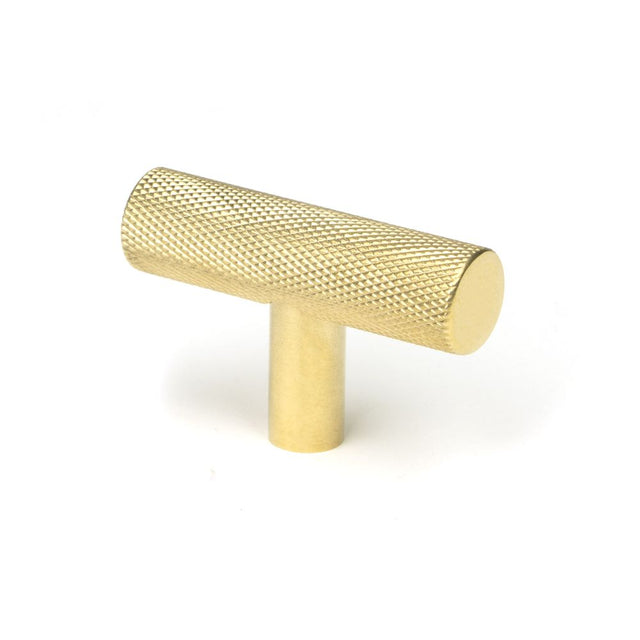 This is an image showing From The Anvil - Polished Brass Brompton T-Bar available from trade door handles, quick delivery and discounted prices