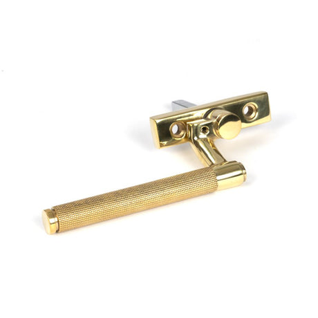 This is an image showing From The Anvil - Polished Brass Brompton Espag - RH available from trade door handles, quick delivery and discounted prices