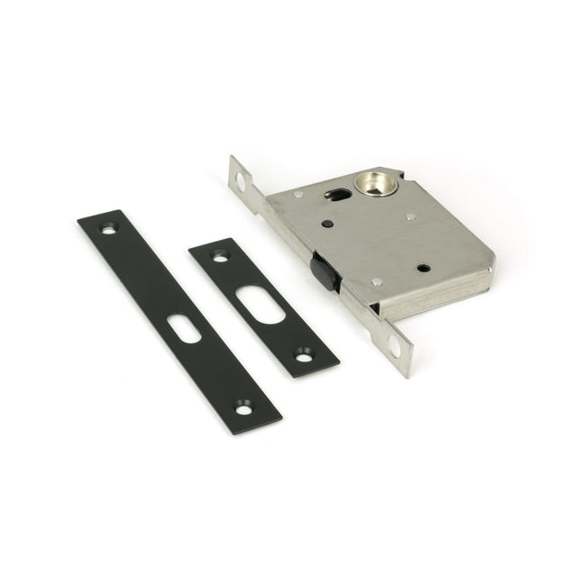 This is an image showing From The Anvil - Matt Black 50mm Sliding Door Lock available from trade door handles, quick delivery and discounted prices