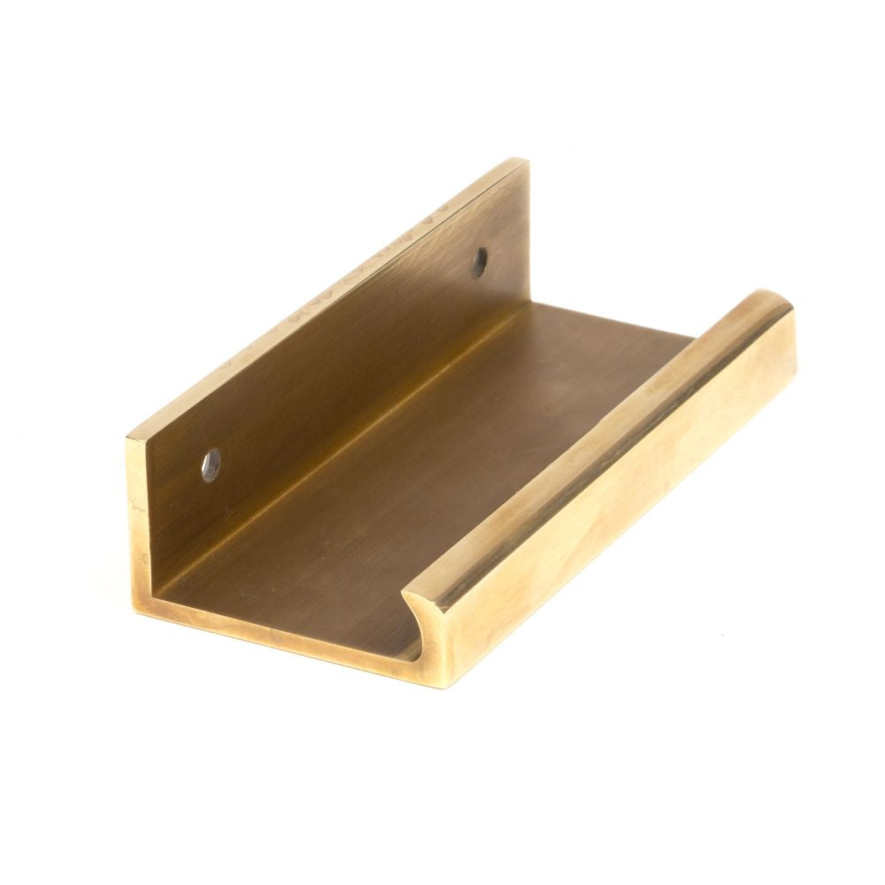 This is an image showing From The Anvil - Aged Brass 100mm Plain Edge Pull available from trade door handles, quick delivery and discounted prices