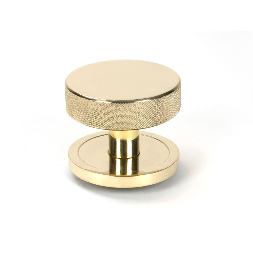 High Quality image of From The Anvil - Polished Brass Brompton Centre Door Knob (Plain) | 50826 | available to order from Trade Door Handles in Kendal.