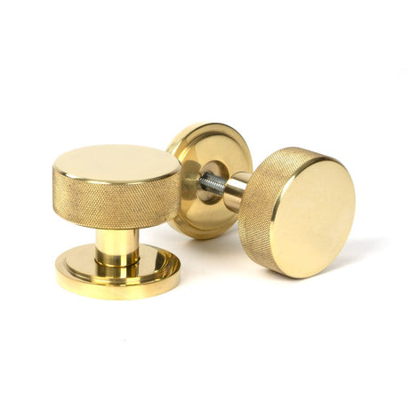 This is an image showing From The Anvil - Polished Brass Brompton Mortice/Rim Knob Set Knob (Art Deco) available from trade door handles, quick delivery and discounted prices