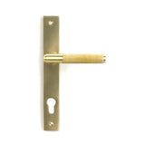 This is an image showing From The Anvil - Satin Brass Brompton Slimline Lever Espag. Lock Set available from trade door handles, quick delivery and discounted prices