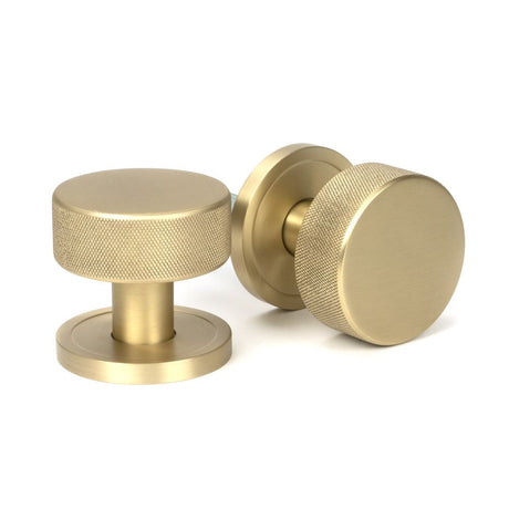 This is an image showing From The Anvil - Satin Brass Brompton Mortice/Rim Knob Set (Plain) available from trade door handles, quick delivery and discounted prices