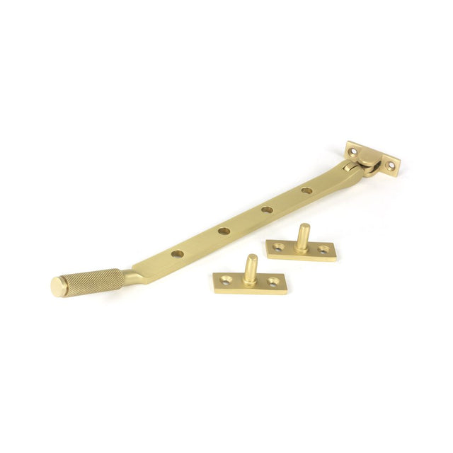 This is an image showing From The Anvil - Satin Brass 10" Brompton Stay available from trade door handles, quick delivery and discounted prices