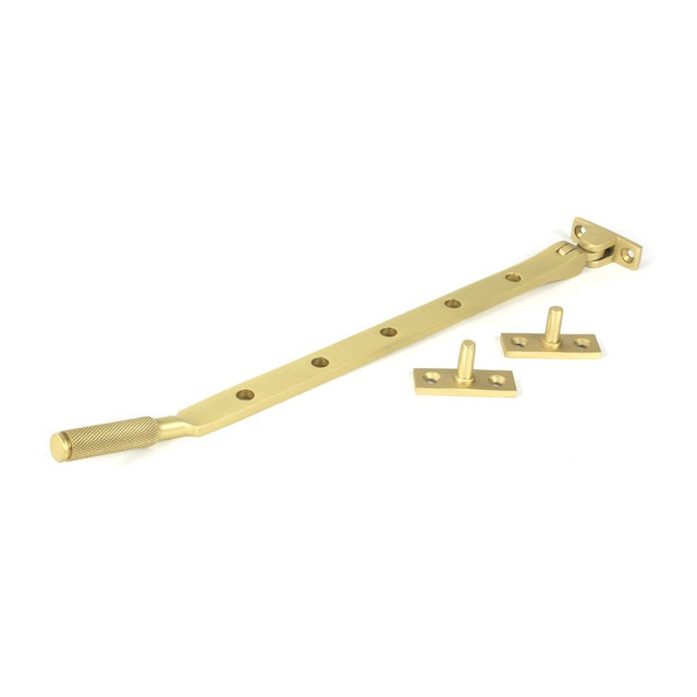 This is an image showing From The Anvil - Satin Brass 12" Brompton Stay available from trade door handles, quick delivery and discounted prices