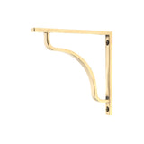 This is an image showing From The Anvil - Aged Brass Abingdon Shelf Bracket (150mm x 150mm) available from trade door handles, quick delivery and discounted prices