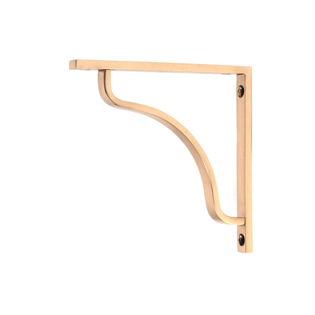 This is an image showing From The Anvil - Polished Bronze Abingdon Shelf Bracket (150mm x 150mm) available from trade door handles, quick delivery and discounted prices