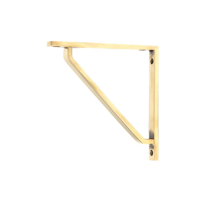 This is an image showing From The Anvil - Aged Brass Barton Shelf Bracket (150mm x 150mm) available from trade door handles, quick delivery and discounted prices