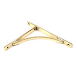 This is an image showing From The Anvil - Aged Brass Apperley Shelf Bracket (260mm x 200mm) available from trade door handles, quick delivery and discounted prices