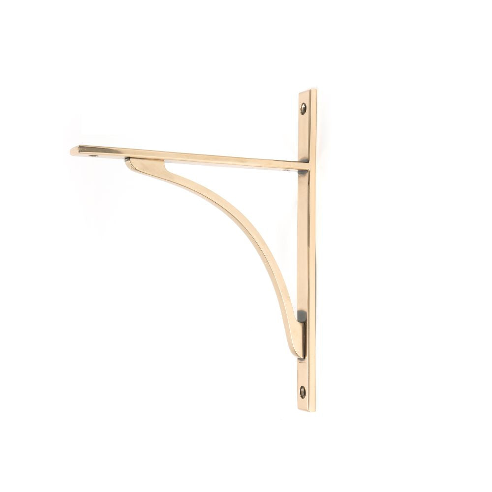 This is an image showing From The Anvil - Polished Bronze Apperley Shelf Bracket (260mm x 200mm) available from trade door handles, quick delivery and discounted prices