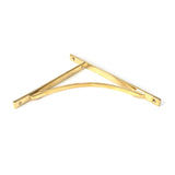 This is an image showing From The Anvil - Polished Brass Apperley Shelf Bracket (314mm x 250mm) available from trade door handles, quick delivery and discounted prices