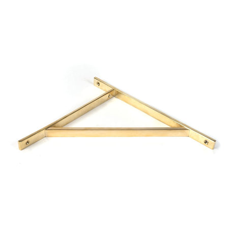 This is an image showing From The Anvil - Polished Brass Chalfont Shelf Bracket (314mm x 250mm) available from trade door handles, quick delivery and discounted prices