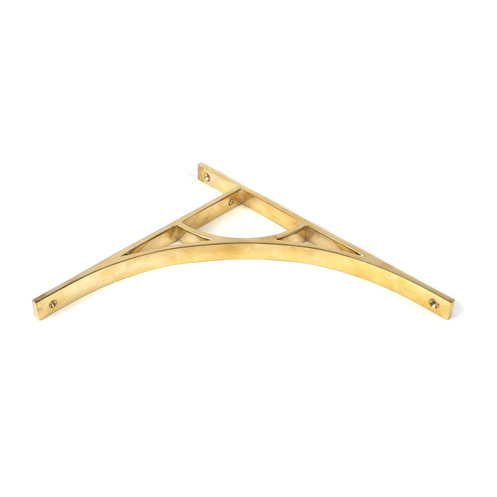 This is an image showing From The Anvil - Polished Brass Tyne Shelf Bracket (314mm x 250mm) available from trade door handles, quick delivery and discounted prices