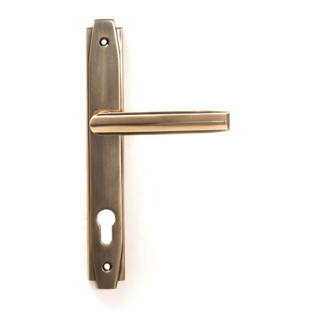 This is an image showing From The Anvil - Polished Bronze Art Deco Slimline Lever Espag. Lock Set available from trade door handles, quick delivery and discounted prices