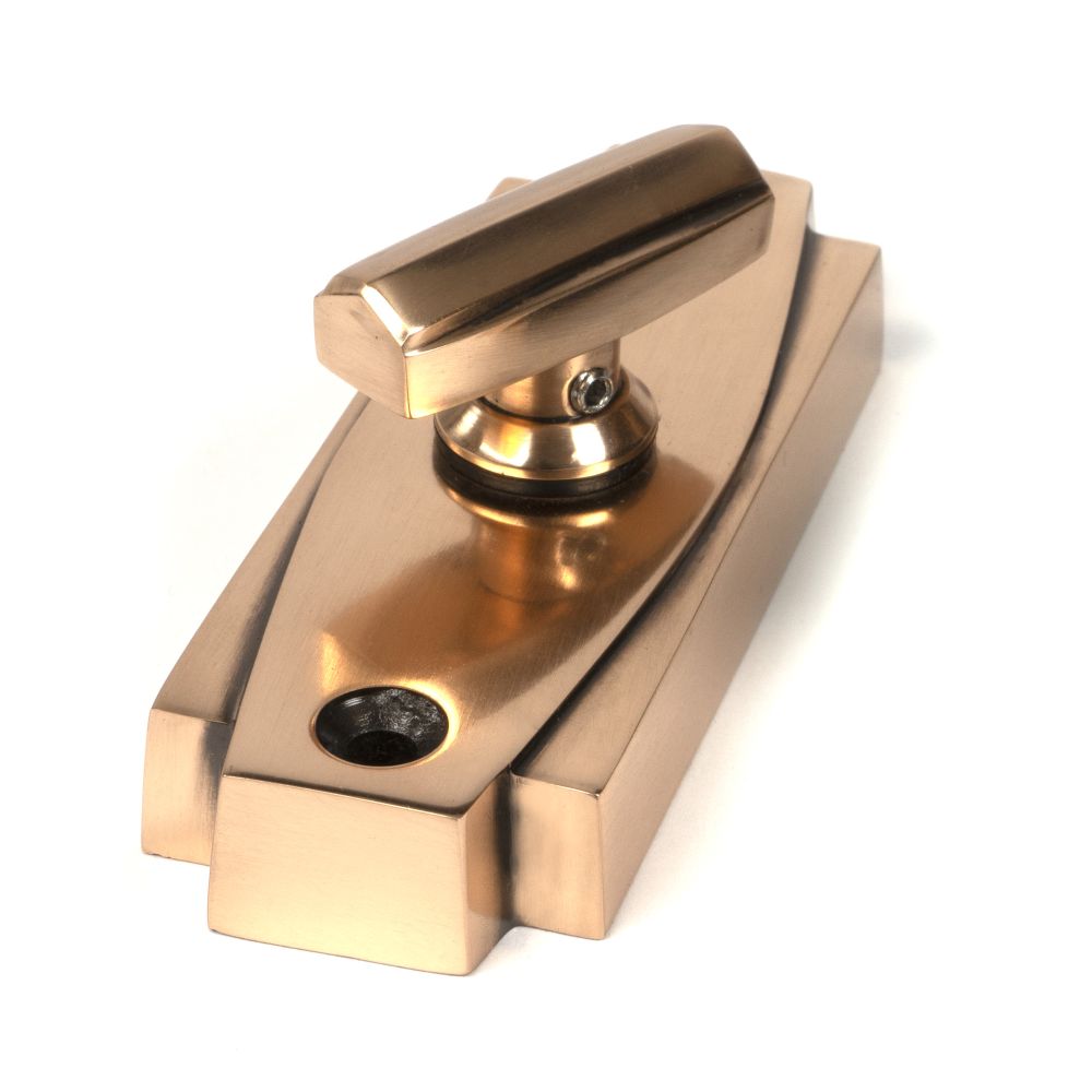 This is an image showing From The Anvil - Polished Bronze Art Deco Thumbturn available from trade door handles, quick delivery and discounted prices