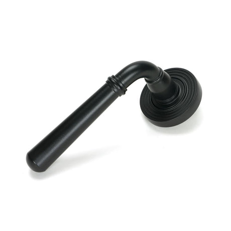 This is an image showing From The Anvil - Matt Black Newbury Lever on Rose Set (Beehive) - Unsprung available from trade door handles, quick delivery and discounted prices