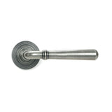 This is an image showing From The Anvil - Pewter Newbury Lever on Rose Set (Beehive) - Unsprung available from trade door handles, quick delivery and discounted prices