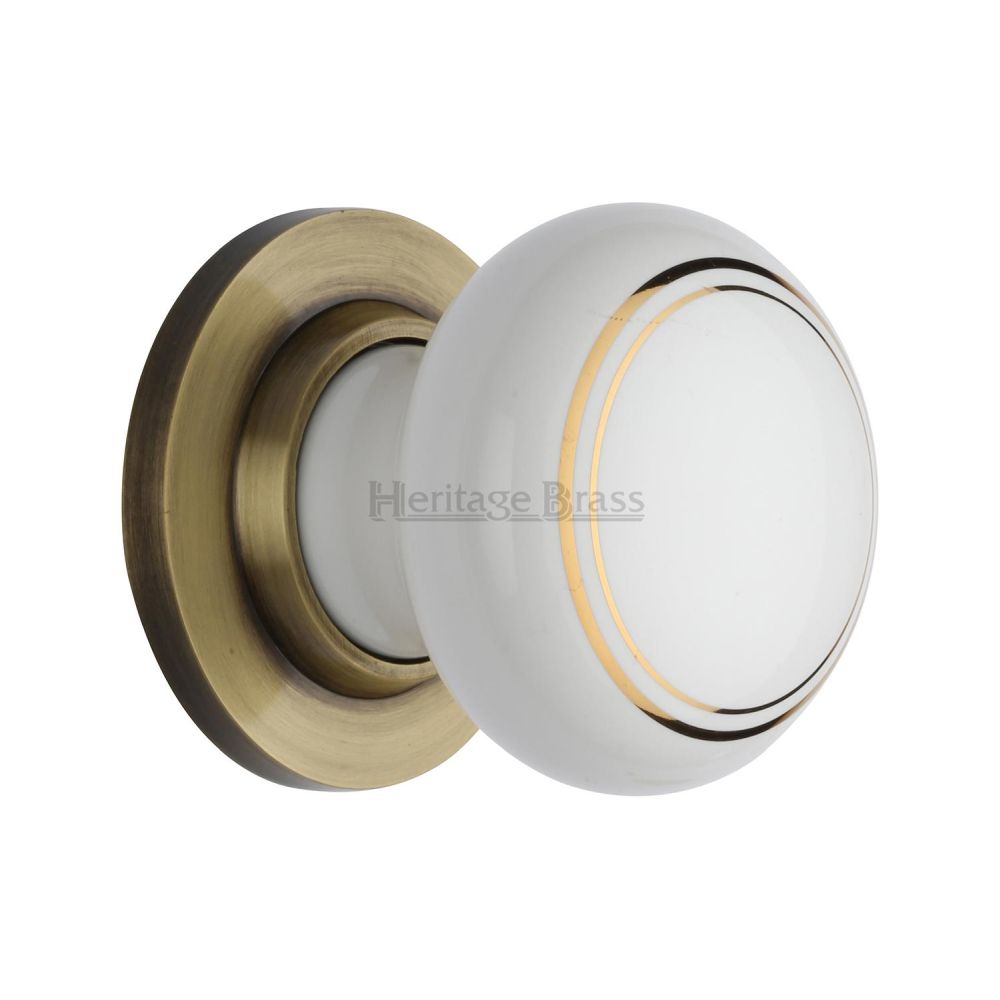 This is an image of a Heritage Brass - Gold Line Knob with Antique Brass base, 6010-at that is available to order from Trade Door Handles in Kendal.