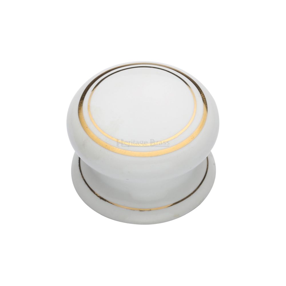 This is an image of a Heritage Brass - Cabinet Knob Gold Line 32mm with Porcelain base, 6032 that is available to order from Trade Door Handles in Kendal.