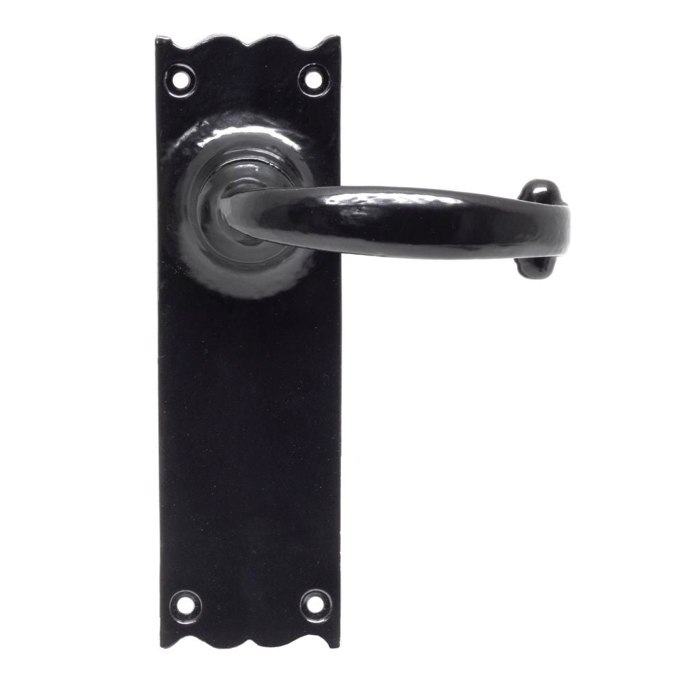 This is an image showing From The Anvil - Black Cottage Lever Latch Set available from trade door handles, quick delivery and discounted prices