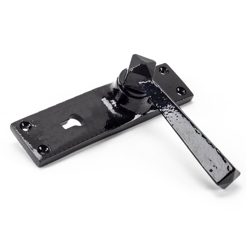 This is an image showing From The Anvil - Black Straight Lever Lock Set available from trade door handles, quick delivery and discounted prices