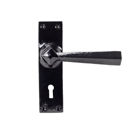 This is an image showing From The Anvil - Black Straight Lever Lock Set available from trade door handles, quick delivery and discounted prices