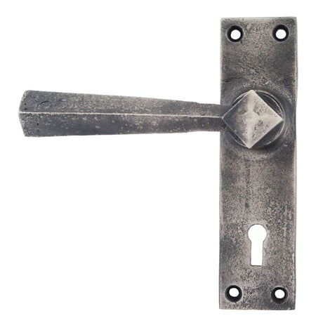 This is an image showing From The Anvil - Antique Pewter Straight Lever Lock Set available from trade door handles, quick delivery and discounted prices