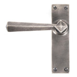 This is an image showing From The Anvil - Antique Pewter Straight Lever Latch Set available from trade door handles, quick delivery and discounted prices