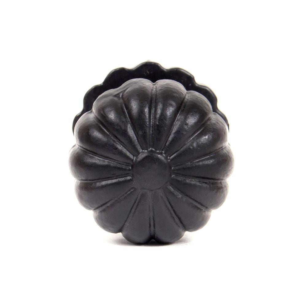 This is an image showing From The Anvil - Black Flower Cabinet Knob - Large available from trade door handles, quick delivery and discounted prices
