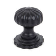 This is an image showing From The Anvil - Black Flower Cabinet Knob - Large available from trade door handles, quick delivery and discounted prices