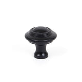 This is an image showing From The Anvil - Black Ringed Cabinet Knob - Large available from trade door handles, quick delivery and discounted prices