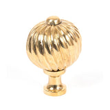 This is an image showing From The Anvil - Polished Brass Spiral Cabinet Knob - Medium available from trade door handles, quick delivery and discounted prices