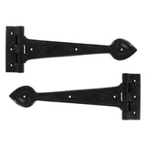 This is an image showing From The Anvil - Black Textured 12" Cast T Hinge (pair) available from trade door handles, quick delivery and discounted prices