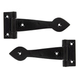 This is an image showing From The Anvil - Black Smooth 6" Cast T Hinge (pair) available from trade door handles, quick delivery and discounted prices