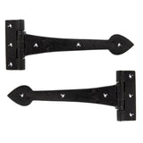 This is an image showing From The Anvil - Black Smooth 10 1/2" Cast T Hinge (pair) available from trade door handles, quick delivery and discounted prices