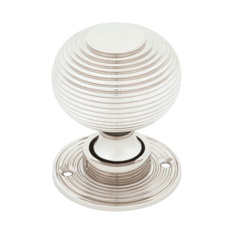 This is an image showing From The Anvil - Polished Nickel Heavy Beehive Mortice/Rim Knob Set available from trade door handles, quick delivery and discounted prices