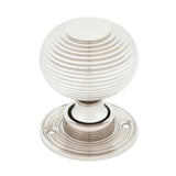 This is an image showing From The Anvil - Polished Nickel Beehive Mortice/Rim Knob Set available from trade door handles, quick delivery and discounted prices