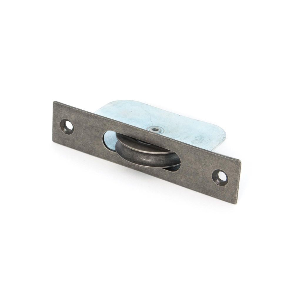 This is an image showing From The Anvil - Antique Pewter Square Ended Sash Pulley 75kg available from trade door handles, quick delivery and discounted prices