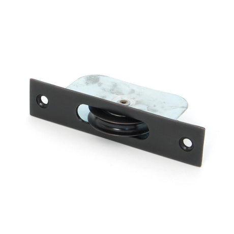 This is an image showing From The Anvil - Beeswax Square Ended Sash Pulley 75kg available from trade door handles, quick delivery and discounted prices