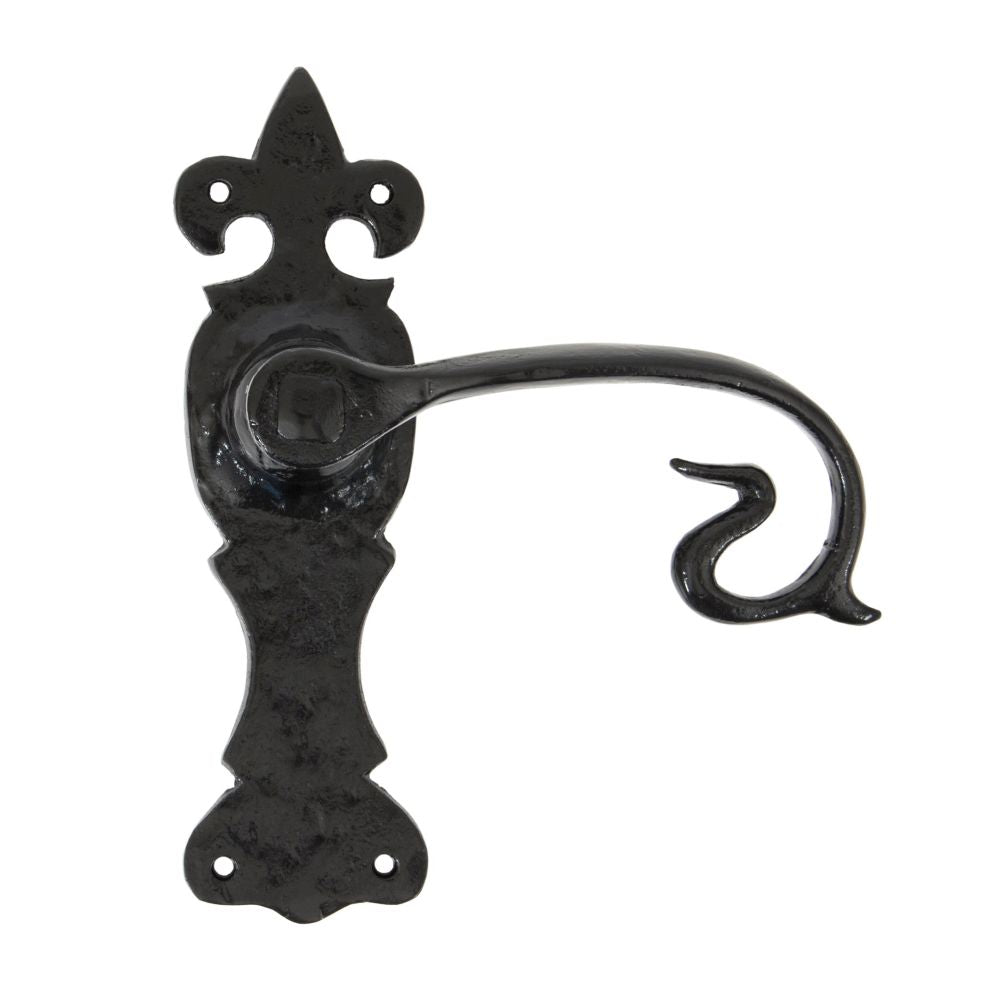 This is an image showing From The Anvil - Black Curly Lever Latch Set available from trade door handles, quick delivery and discounted prices