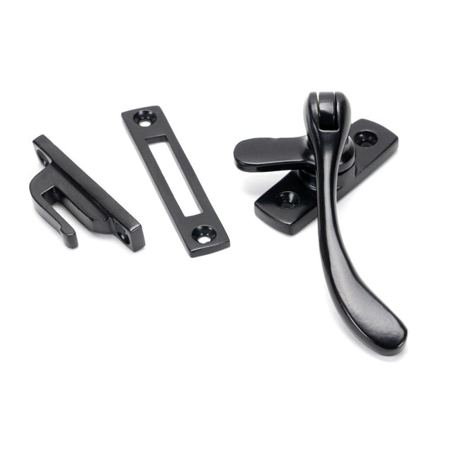 This is an image showing From The Anvil - Black Peardrop Fastener available from trade door handles, quick delivery and discounted prices