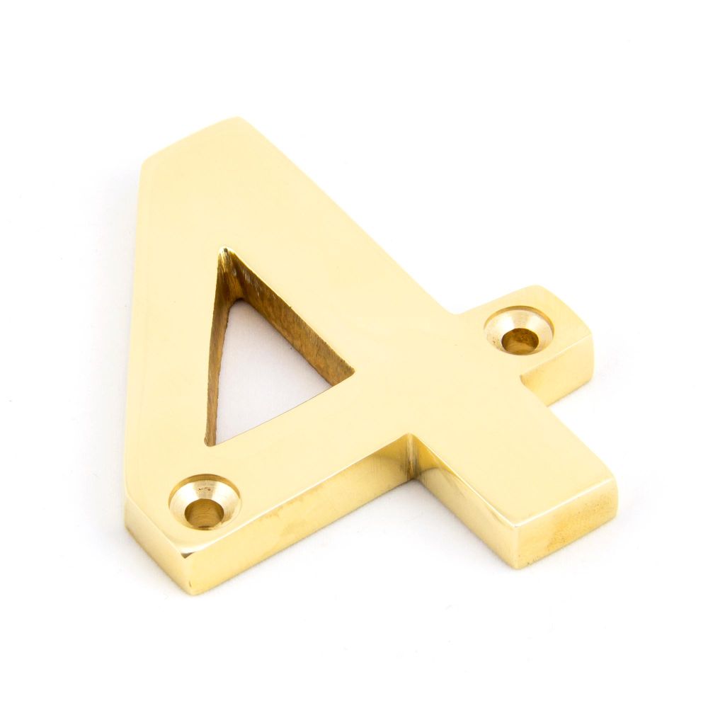 This is an image showing From The Anvil - Polished Brass Numeral 4 available from trade door handles, quick delivery and discounted prices